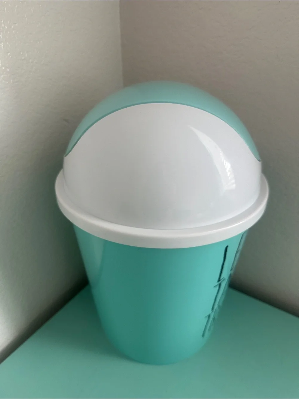 Essential Home Designs-basic plastic trash can with swinging top-new